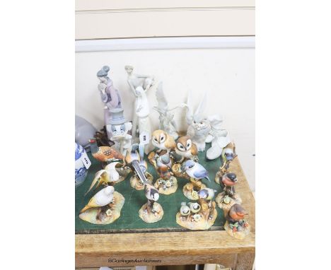   A collection of Royal Crown Derby models of birds (with boxes) and a group of Nao figures