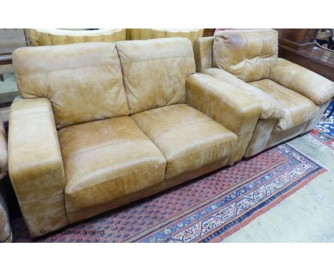   A contemporary tanned leather two seater sofa, length 156cm, depth 94cm, height 82cm and similar armchair