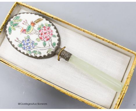   A small Chinese hand mirror with bowenite jade handle, 15cm