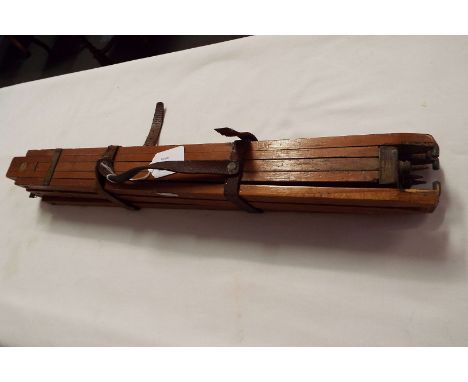 A 19thC mahogany Thornton Pickard triple extending camera tripod
