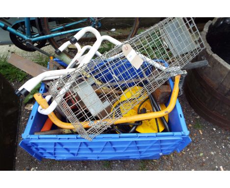 A box of assorted tools to include hammers, saws, extension leads etc