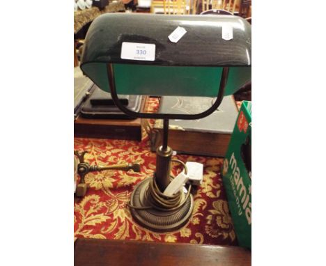 A brass and green glass library lamp