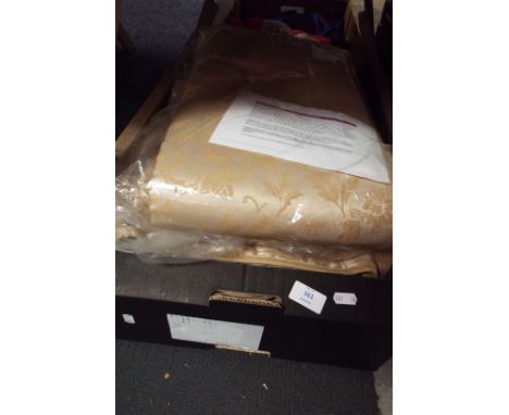 A selection of Sovereign gold curtains and material