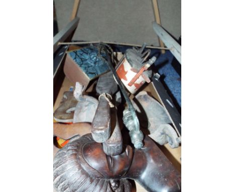 An Arts and Crafts book slide, carve hardwood female bust, wooden ornaments, carved wooden Oriental lamp, lion mask book ends