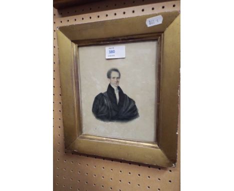 A 19thC watercolour portrait of a gentleman in black robes, some details verso, framed