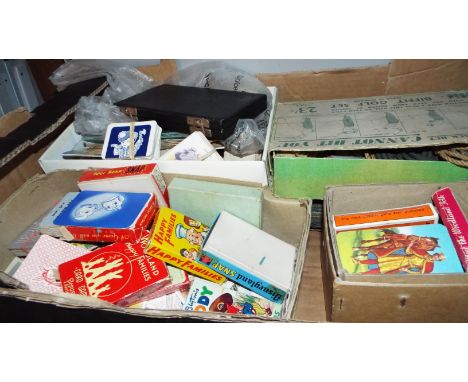 A mixed selection of tea and cigarette cards, playing cards, etc
