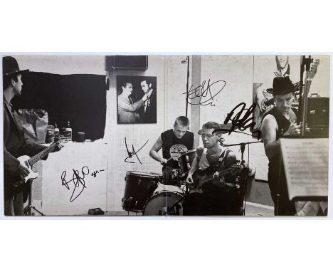 A copy of U2 - Rattle and Hum (U27) with LP signed to gatefold inner by Bono, The Edge, Larry Mullen Jr and Adam Clayton. Som
