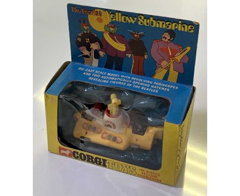 An original 1968 Corgi Yellow Submarine toy in box. Toy in excellent condition. The plastic casing on the box has cracked.