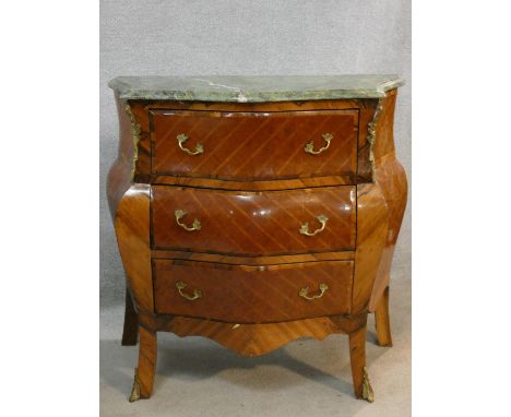 A French bombe style kingwood and inlaid commode with marble top and ormolu mounts on cabriole supports. H.80 W.81 D.42cm