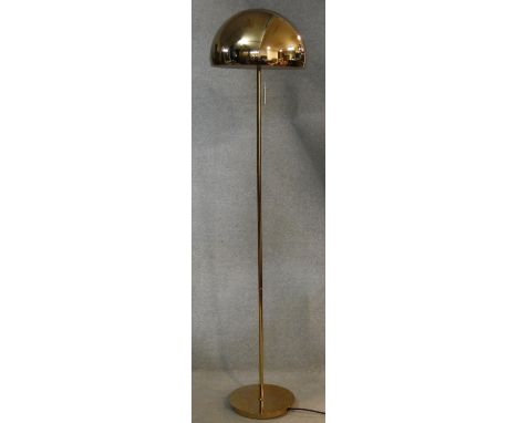 A vintage style standard lamp with brass domed shade and base. H.150cm 