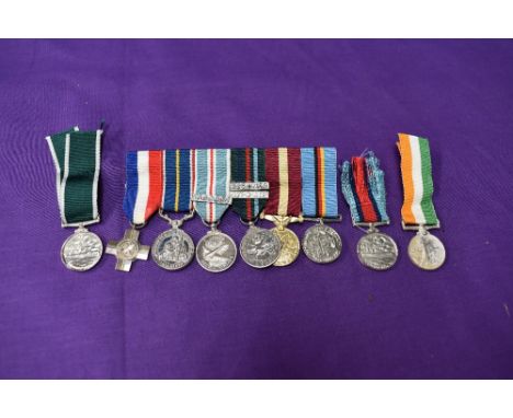 A group of six miniature medals, General Service Cross, National Service Medal, British Army of the Rhine Medal with Berlin A