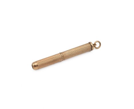 9ct gold hallmarked propelling tooth pick with engine turned decoration to the body, weight 5.7 grams.