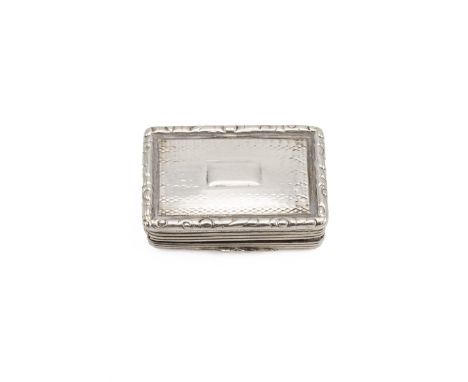 Silver gilt Vinaigrette with gadroon border and engine turned decoration to the lid, rising to a pierced gilt grill, hallmark
