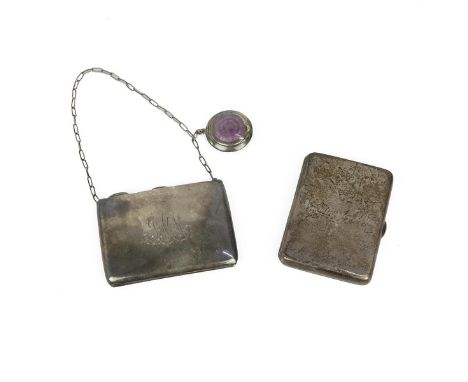 Two hallmarked silver purses, Chester 1906 and Birmingham 1938, each lined with leather, with notes, cards, ivorine jotters a