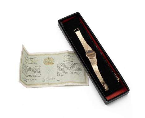 Bueche Girod ladies vintage 9ct gold wristwatch. 15mm case, tigers eye dial with gold dauphine hands. Boxed and guarantee cer