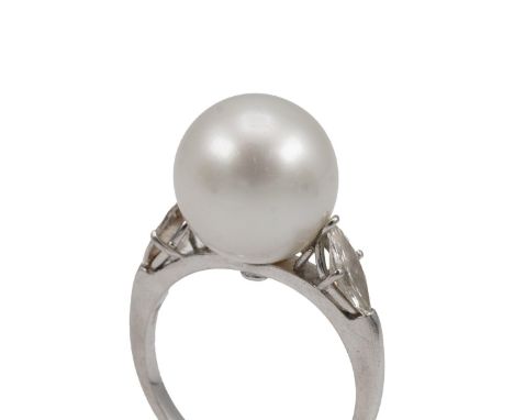 Cultured pearl and diamond ring,&nbsp;centring on a large cultured pearl measuring 13mm, between shoulders set with marquise-