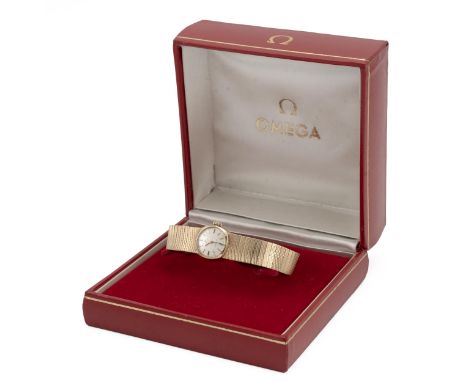 Omega ladies 9ct gold hallmarked wristwatch, manual wind,round silver dial signed Omega Ladymatic baton markers, with origina