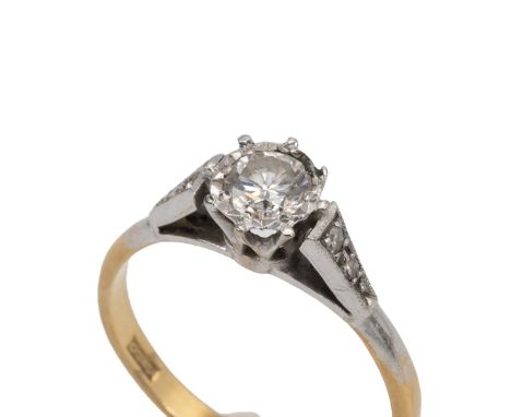 18ct gold hallmarked diamond ring, the central diamond approx 0.25 carats, mounted in a claw setting flanked by a further fou