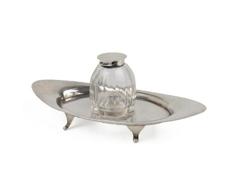 A silver Standish. The facetted removable glass inkwell with hinged silver top,&nbsp; hallmarked for Birmingham 1912 with mak