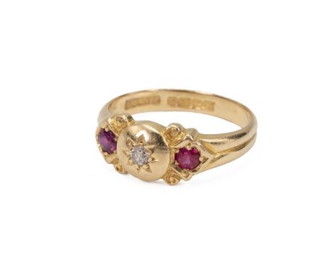 Victorian 18ct gold, three stone diamond and ruby set ring, the old cut diamond in a star setting, surmounted by two smaller 