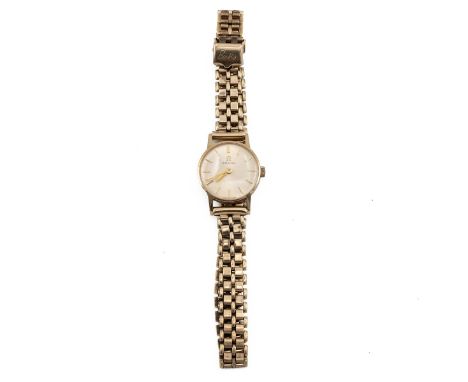 9ct Omega ladies wristwatch hallmarked 375 9ct the dial with batons, with gate bracelet strap.