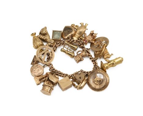 9ct gold charm bracelet with 21 assorted charms, including binoculars, compass, roulette wheel, marriage vows, elephant etc. 