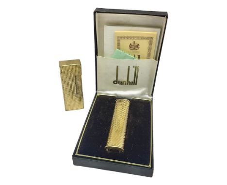 Dunhill gold plated dress lighter, in original fitted case with paperwork, together with a Dunhill rolagas lighter