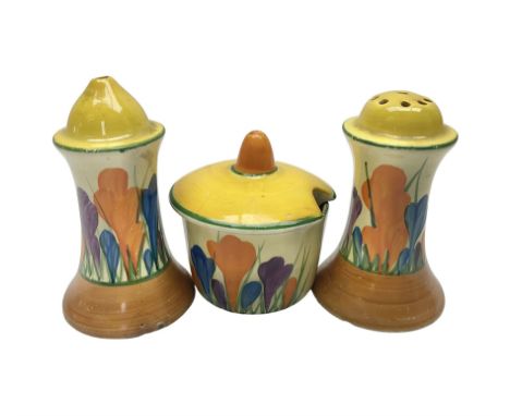 Clarice Cliff Bizarre for Newport Pottery, Muffineer cruet set in Crocus pattern, comprising mustard pot, salt shaker and pep