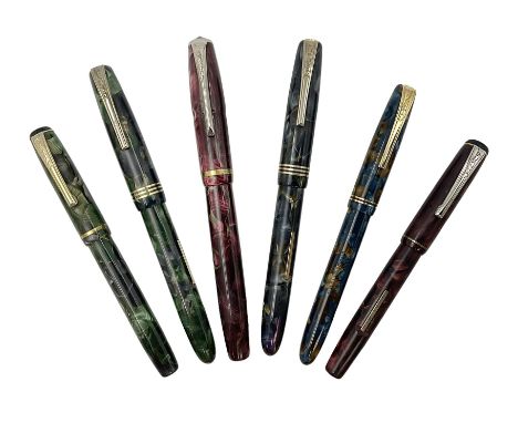 Six Burnham marbleised fountain pens, four with 14ct gold nibsCondition Report: Model numbers 44, 47, B48, B59, B59, 54