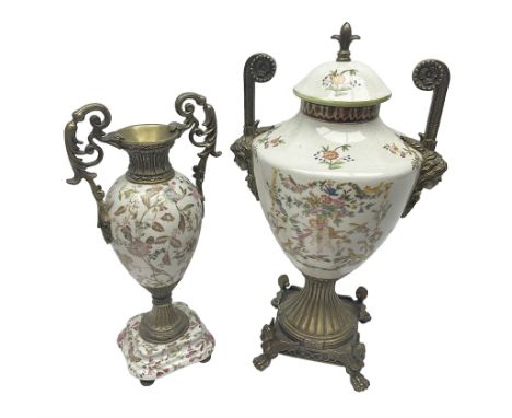 Wong Lee, twin handled ceramic urn with enamelled floral decoration and bronzed metal mounts, upon a square base, marked to b