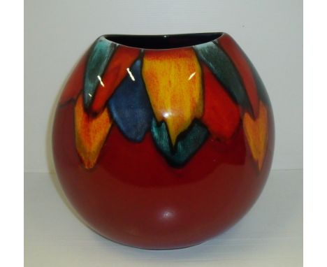 Large ovoid Poole Pottery vase with geometric pattern on red ground