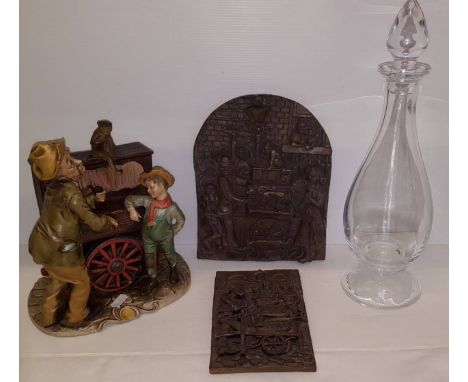 Two Robert Olley moulded plaques, glass decanter with reverse etched floral design and musical capo de monte figure group