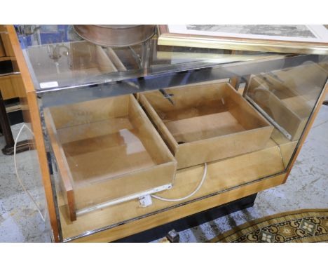 Art Deco style shop display counter in maple effect frame