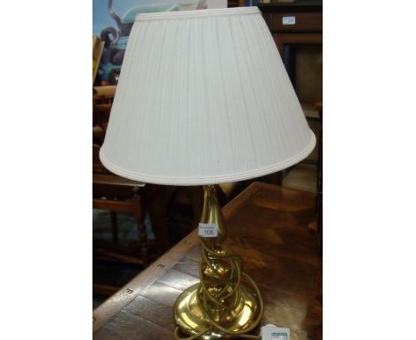 Brass table lamp on circular base with plated shade 
