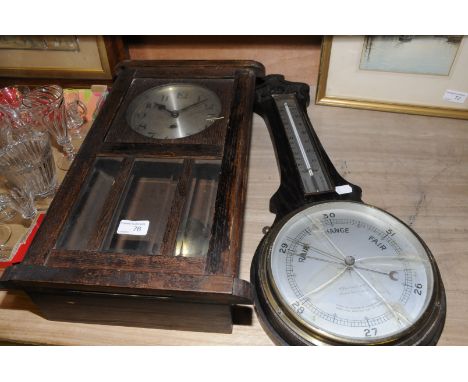 Oak cased wall clock and carved oak aneroid barometer retailed by W greenwood & Sons Leeds and Huddersfield