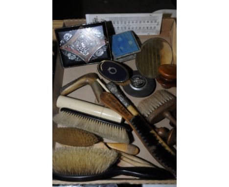 Clothes brushes, horn handle for a walking stick, two barometer & thermometer plaques, small inlaid papier mache box lid etc