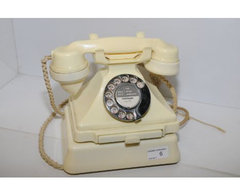 Ivory telephone type 232 with matching ivory bell set 26 with cream braided cords 