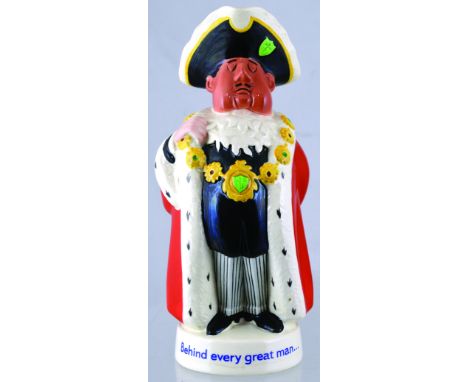 WORTHINGTONS LORD MAYOR FIGURE. 9ins tall, multicoloured ceramic model of a lord mayor stood with bottle of Worthingtons behi