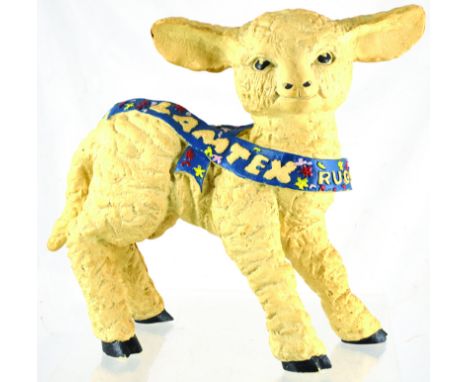 LAMTEX RUGS ADVERTISING FIGURE. 10ins tall, 1950s rubberoid lamb advertising LAMTEX RUGS within blue floral sash around. Some