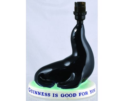 GUINNESS SEAL LAMP BASE. 9ins tall to top of bulb fitting. Classic Guinness seal figure, GUINNESS IS GOOD FOR YOU, around bas