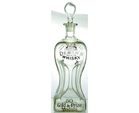 DEWARS GLASS WHISKY DECANTER. 14.5ins tall to top of stopper, shapely decanter. Acid etched detailed Royal Warrant, Coat of A