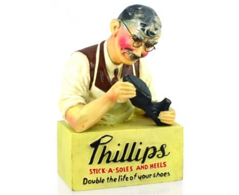 BERITEX PHILLIPS SHOP ADVERTISING DISPLAY FIGURE.  12ins tall, naturalistically coloured rubberoid figure - cobbler wearing s