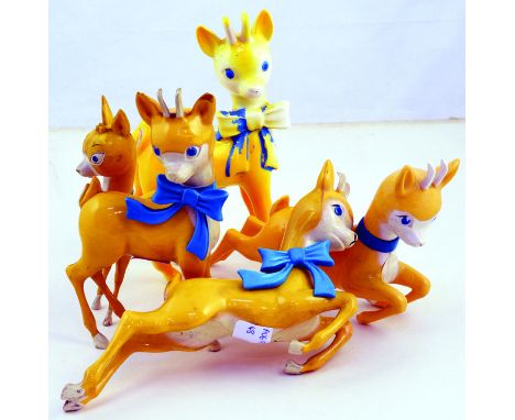 BABYCHAM GROUP. 4 early plastic classic deer figures, yellow with blue bows (2 missing) plus ceramic example (some wear). (5)