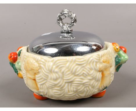 A Clarice Cliff Celtic harvest preserve pot.