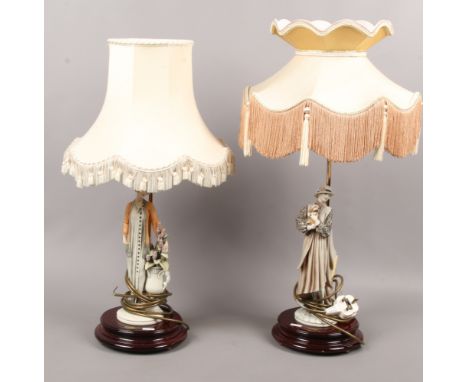 Two Capodimonte figural table lamps, signed Giuseppe Armani, one formed as a lady holding a dog and the other a lady stood ne