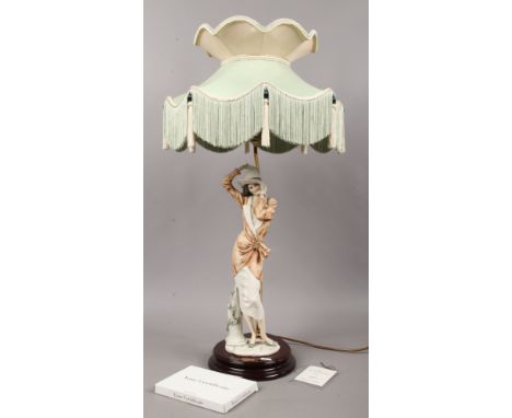 A limited edition Capodimonte figural table lamp, signed Giuseppe Armani with certificate.