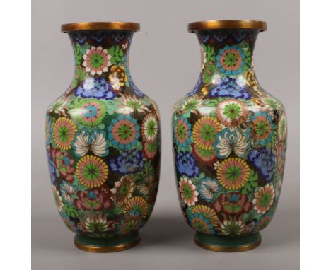 A pair of Japanese Taisho period cloisonne mantel vases of baluster form decorated with chrysanthemums and peonies, 22.5cm. A