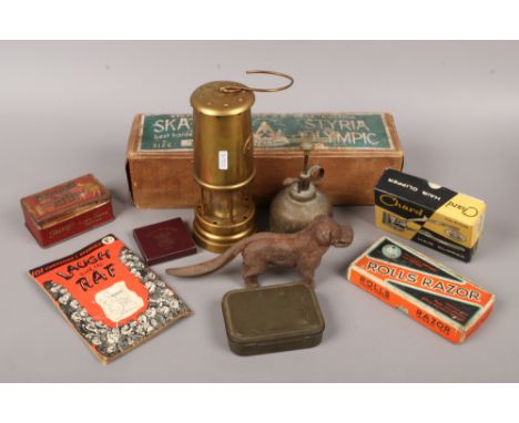 A group of mostly vintage collectables including boxed Austrian skates, a military issue gun cleaning kit, miners lamp, adver