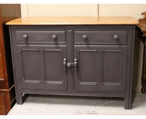 A part painted Ercol sideboard.