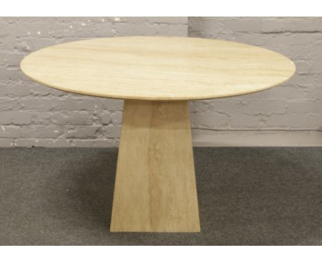 A reconstituted marble circular formed table raised on tapering square formed base, 12cm diameter.